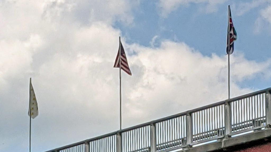 A Photo looking up at the flags of the French and Indian War in 2021from the local park